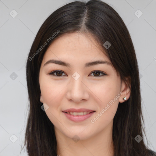 Joyful asian young-adult female with long  brown hair and brown eyes