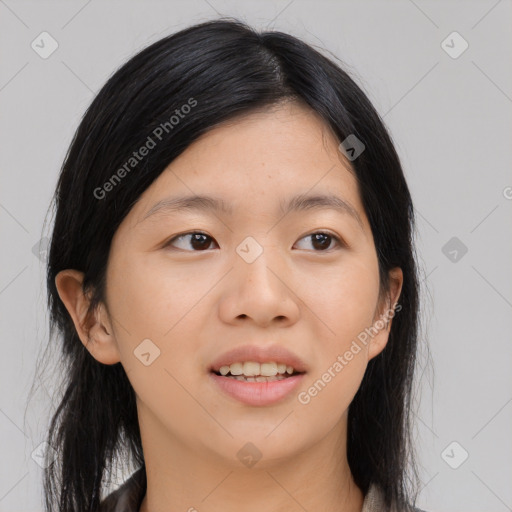 Joyful asian young-adult female with long  brown hair and brown eyes