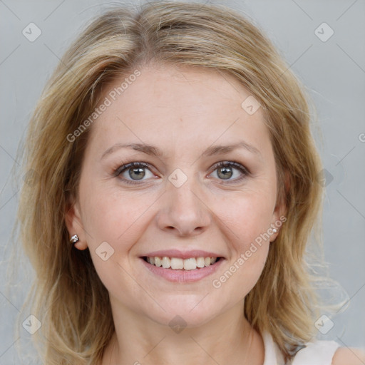 Joyful white young-adult female with medium  brown hair and blue eyes