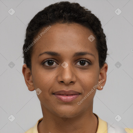 Joyful black young-adult female with short  brown hair and brown eyes