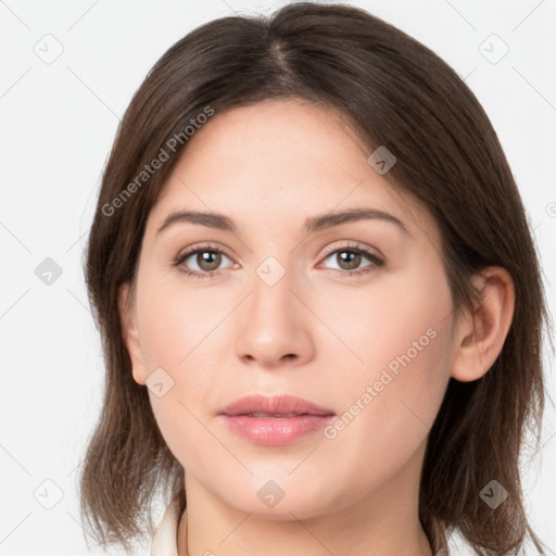 Neutral white young-adult female with medium  brown hair and brown eyes