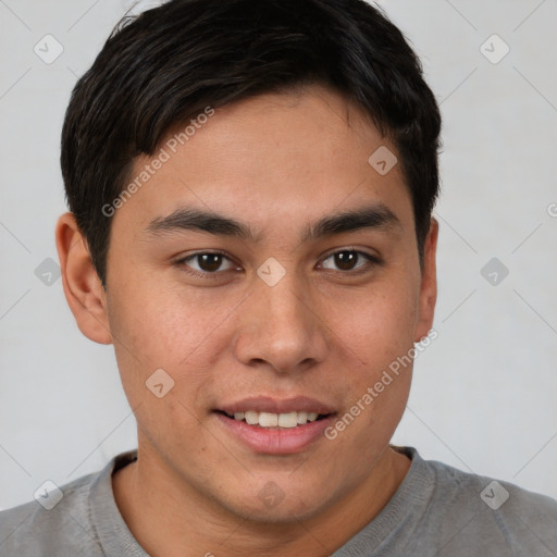 Joyful asian young-adult male with short  brown hair and brown eyes