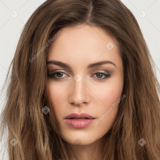 Neutral white young-adult female with long  brown hair and brown eyes