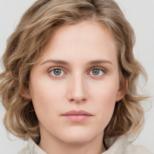 Neutral white young-adult female with medium  brown hair and blue eyes