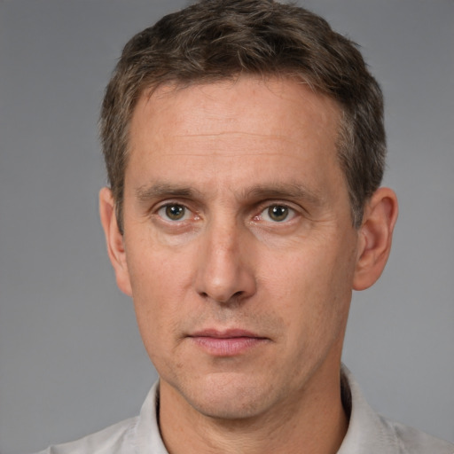 Neutral white adult male with short  brown hair and brown eyes