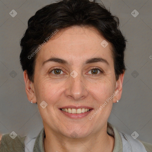 Joyful white adult female with short  brown hair and brown eyes