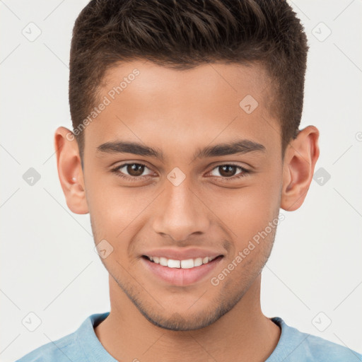 Joyful white child male with short  brown hair and brown eyes