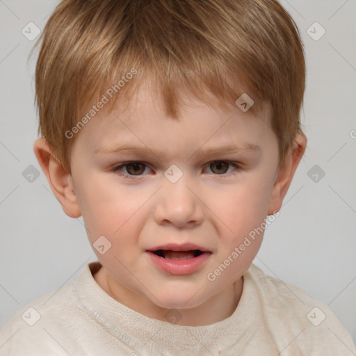 Joyful white child male with short  brown hair and brown eyes