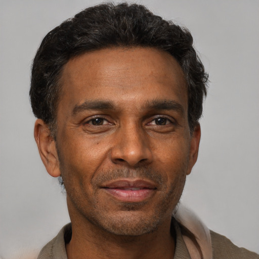Neutral black adult male with short  brown hair and brown eyes