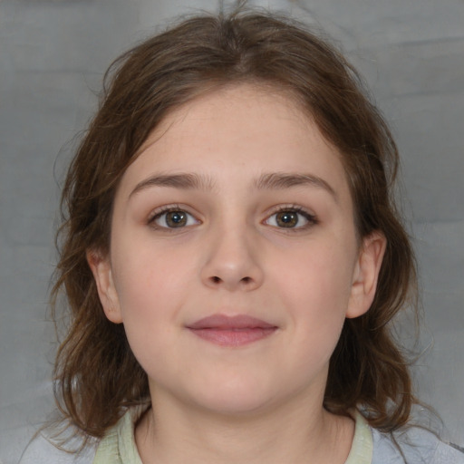 Joyful white child female with medium  brown hair and brown eyes