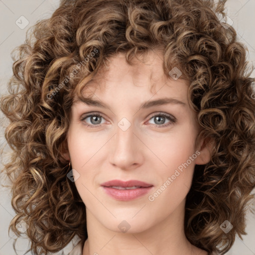 Joyful white young-adult female with medium  brown hair and green eyes