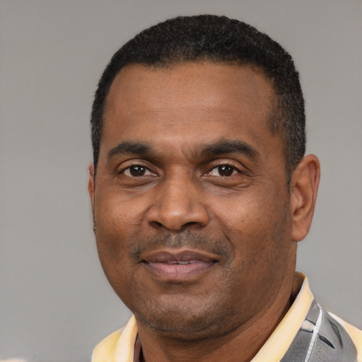 Neutral latino adult male with short  black hair and brown eyes