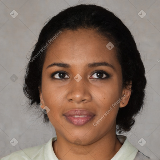 Joyful black young-adult female with medium  black hair and brown eyes