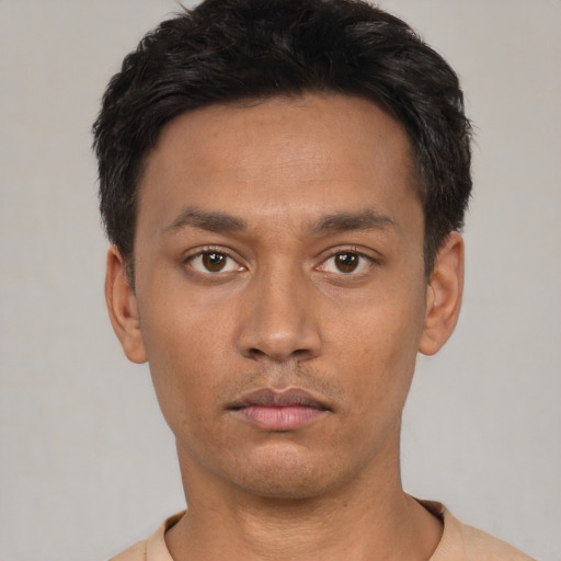 Neutral latino young-adult male with short  black hair and brown eyes