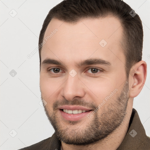 Joyful white young-adult male with short  brown hair and brown eyes