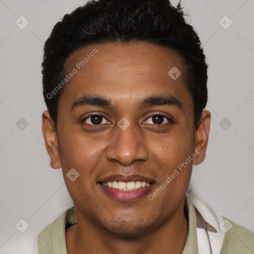 Joyful black young-adult male with short  black hair and brown eyes