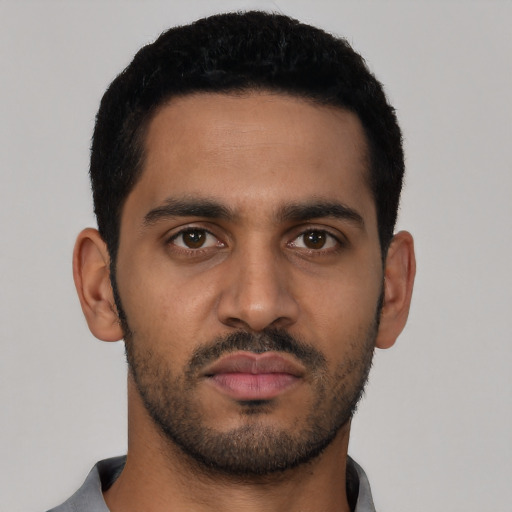 Neutral latino young-adult male with short  black hair and brown eyes