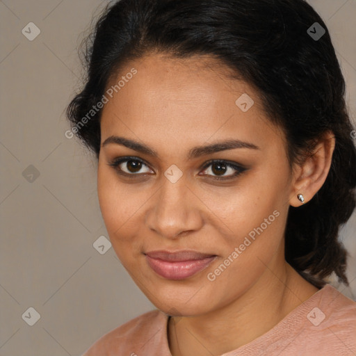 Joyful latino young-adult female with medium  brown hair and brown eyes