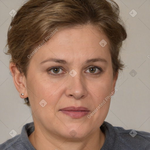 Joyful white adult female with short  brown hair and grey eyes