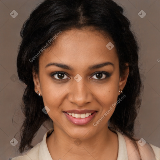 Joyful black young-adult female with long  brown hair and brown eyes