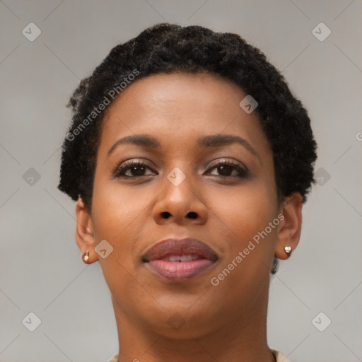 Joyful black young-adult female with short  brown hair and brown eyes