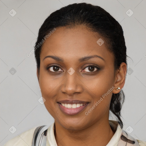 Joyful latino young-adult female with short  black hair and brown eyes