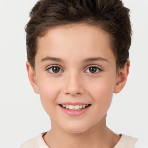 Joyful white child female with short  brown hair and brown eyes