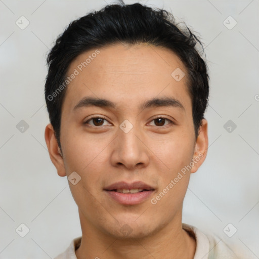 Joyful asian young-adult male with short  black hair and brown eyes