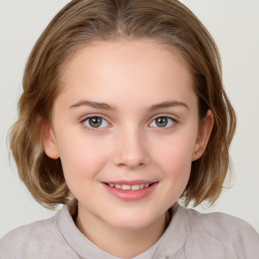 Joyful white child female with medium  brown hair and brown eyes