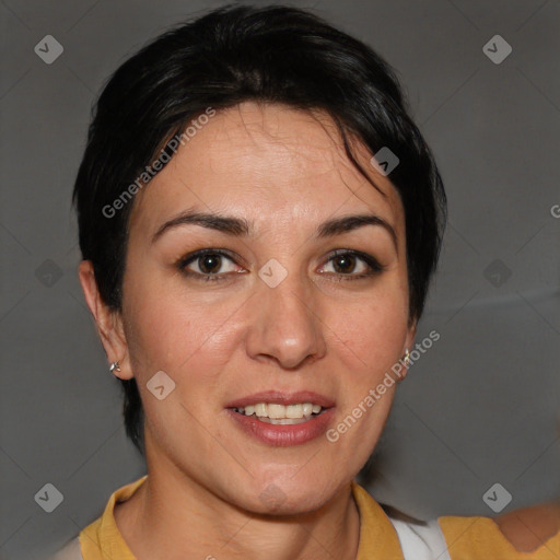 Joyful white adult female with short  brown hair and brown eyes