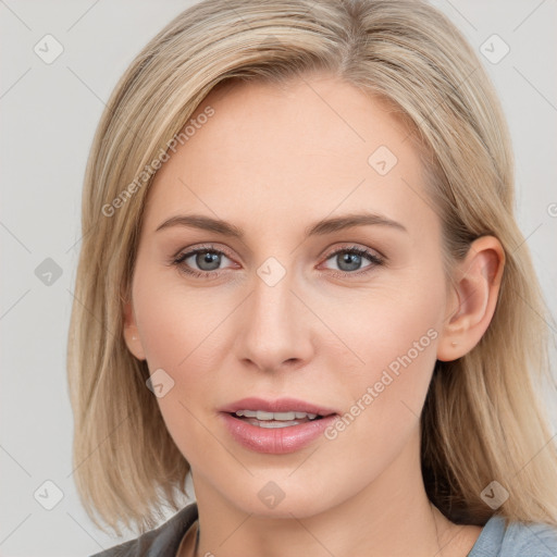 Joyful white young-adult female with medium  brown hair and blue eyes