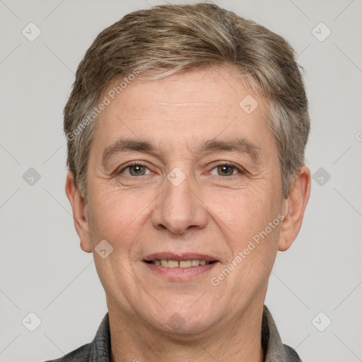 Joyful white adult male with short  brown hair and grey eyes