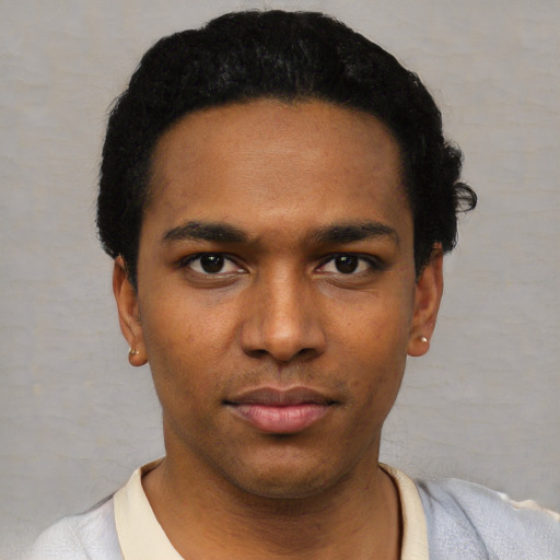 Neutral black young-adult male with short  black hair and brown eyes