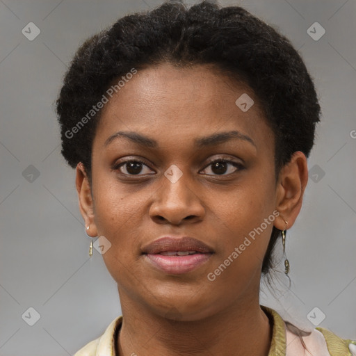 Joyful black young-adult female with short  brown hair and brown eyes