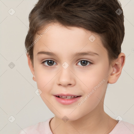 Joyful white child female with short  brown hair and brown eyes