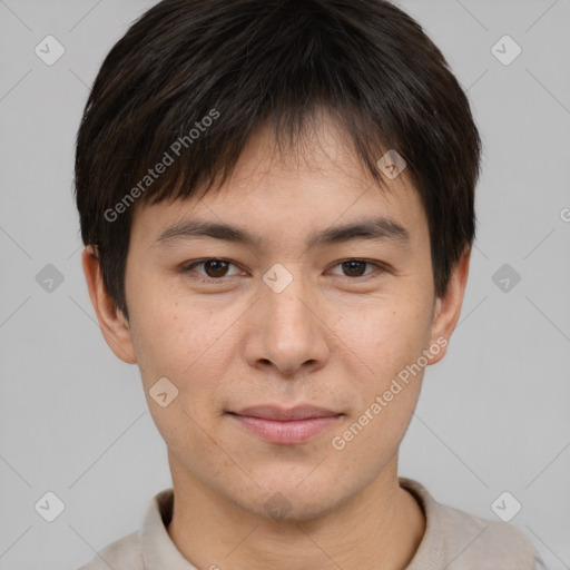 Joyful asian young-adult male with short  brown hair and brown eyes