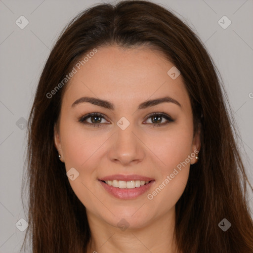 Joyful white young-adult female with long  brown hair and brown eyes