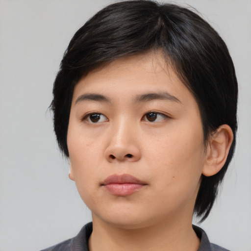Neutral asian young-adult female with medium  black hair and brown eyes
