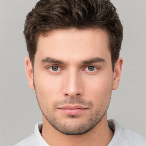 Neutral white young-adult male with short  brown hair and brown eyes