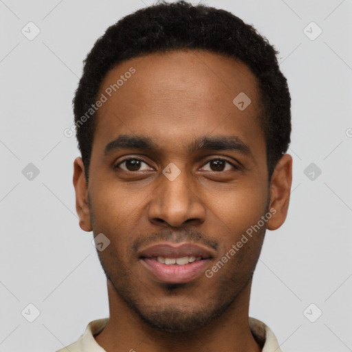 Joyful black young-adult male with short  black hair and brown eyes