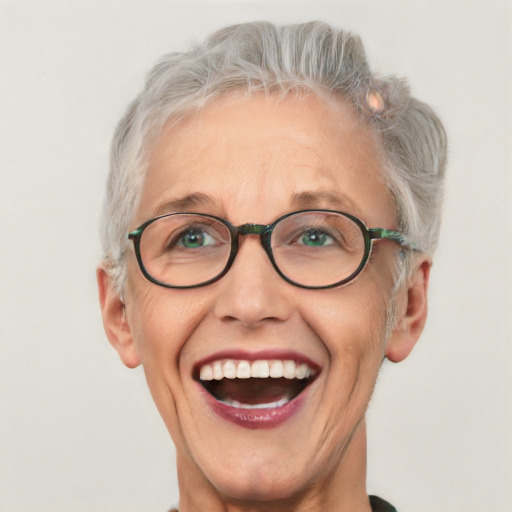 Joyful white middle-aged female with short  gray hair and blue eyes