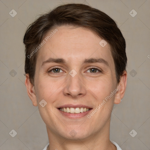 Joyful white adult male with short  brown hair and grey eyes