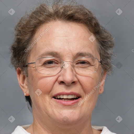 Joyful white middle-aged female with short  brown hair and brown eyes