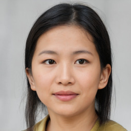 Joyful asian young-adult female with medium  brown hair and brown eyes