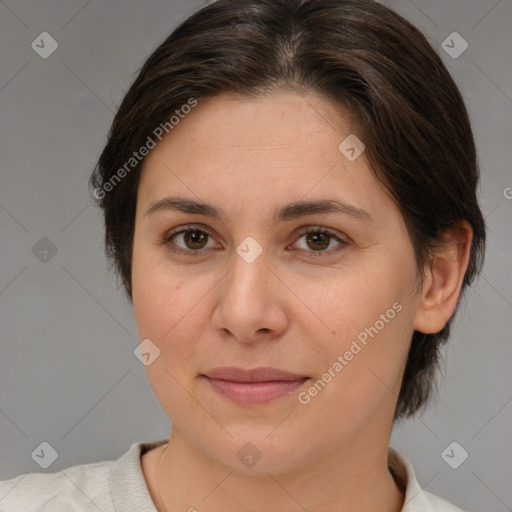 Joyful white young-adult female with medium  brown hair and brown eyes