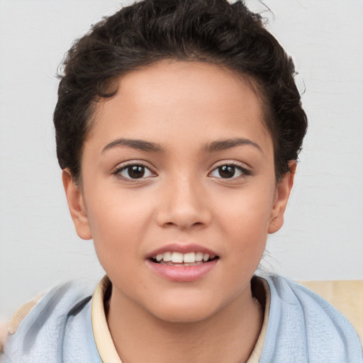 Joyful white child female with short  brown hair and brown eyes