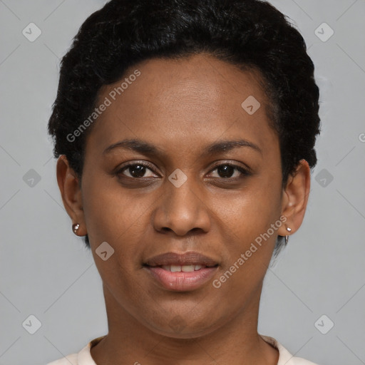 Joyful black young-adult female with short  brown hair and brown eyes