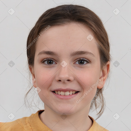 Joyful white child female with medium  brown hair and grey eyes
