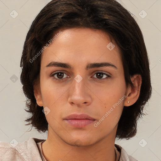 Neutral white young-adult female with medium  brown hair and brown eyes