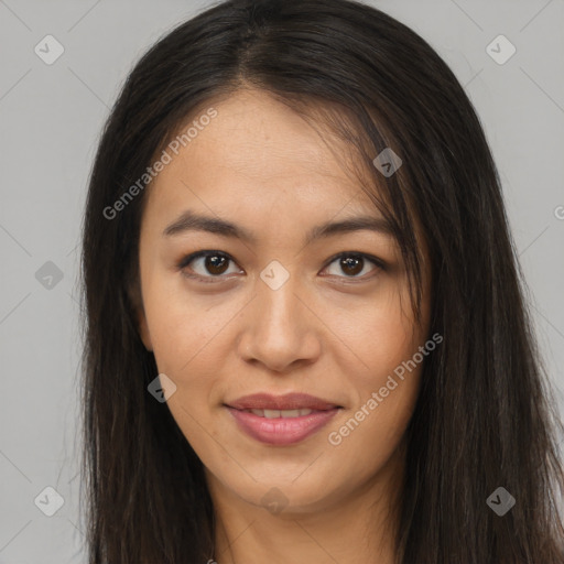 Joyful asian young-adult female with long  brown hair and brown eyes